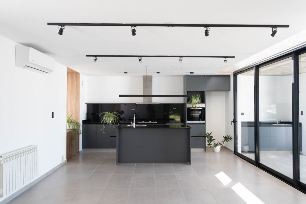 casa esquina cocina comedor isla luminaria moderna